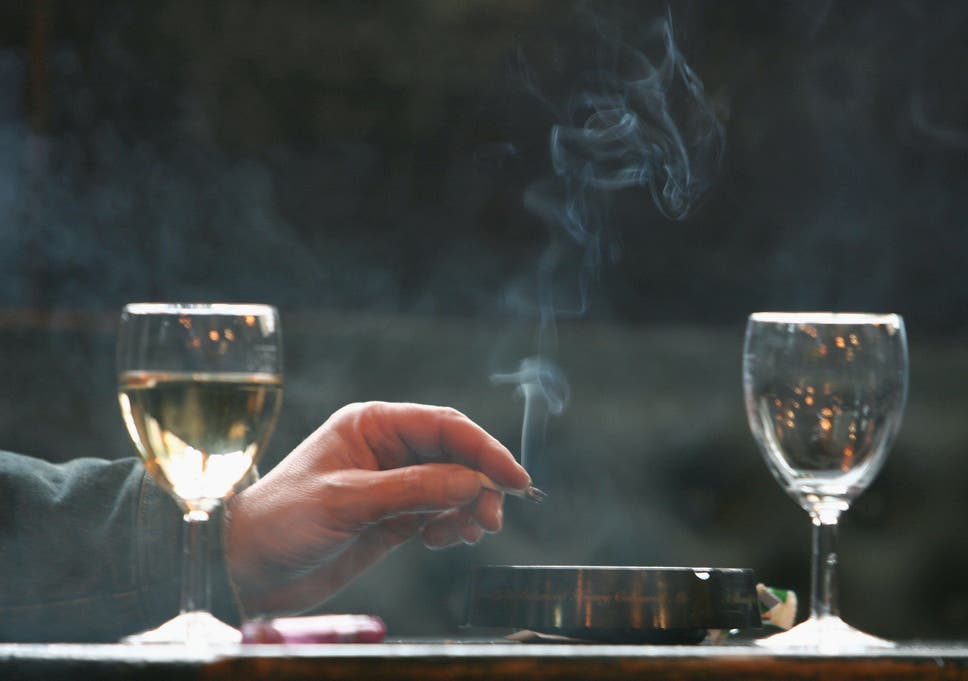 Glass of wine before cigarette 'can prevent damage' | The Independent