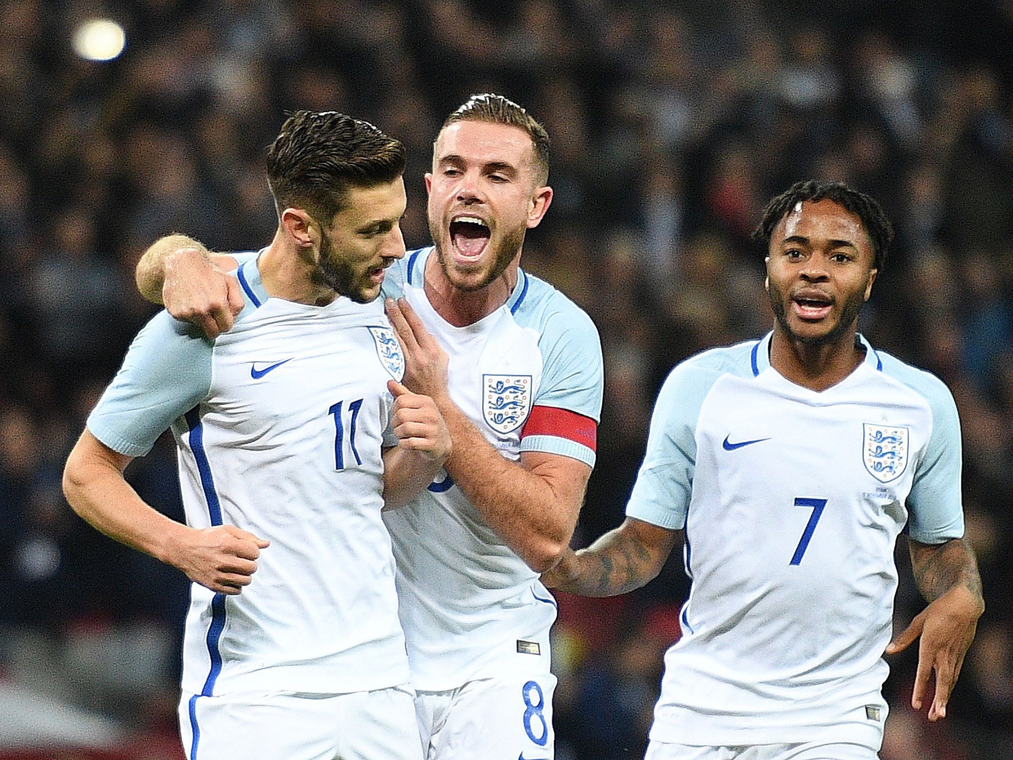 Lallana is congratulated on opening the scoring by Henderson and Sterling