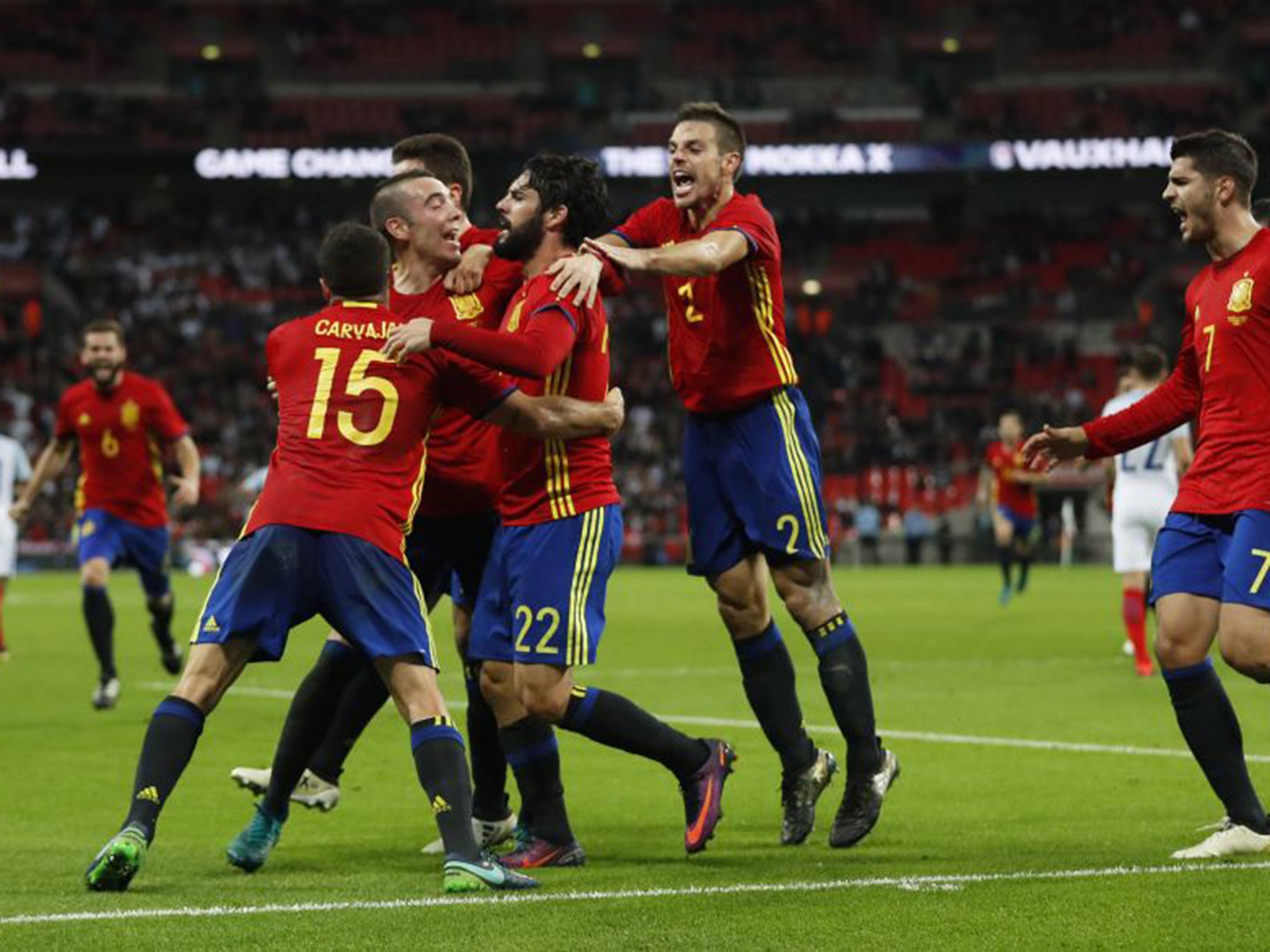 Spain's players celebrate after Isco's late equaliser