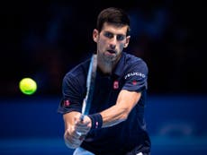 Djokovic edges out Raonic to seal World Tour finals last four spot