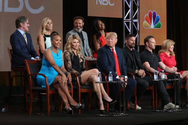 The Celebrity Apprentice executive producer Mark Burnett sits directly behind Donald Trump during a panel discussion