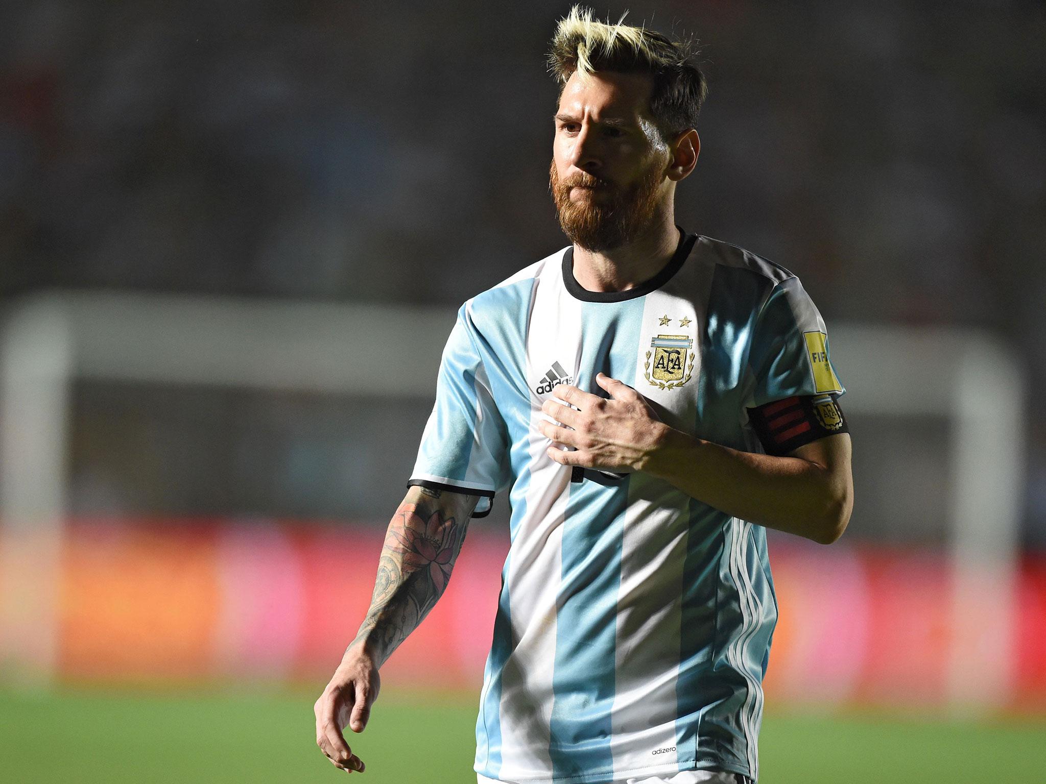 Messi was approached by desperate workers before his side's 3-0 defeat to Brazil