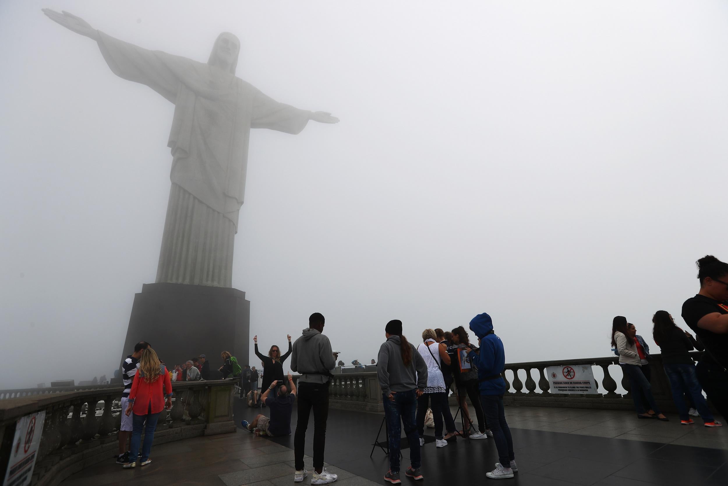 Clouds and mist sometimes spoil the view of Christ the Redeemer in Brazil