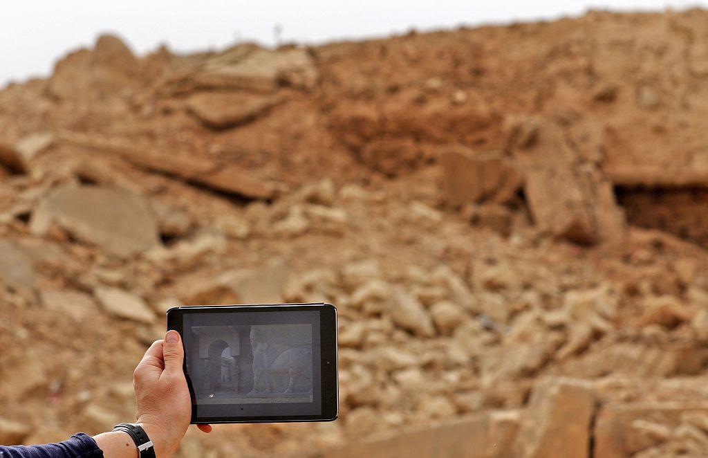 A tablet shows the ancient ruins of Nimrud as they were before the destruction took place