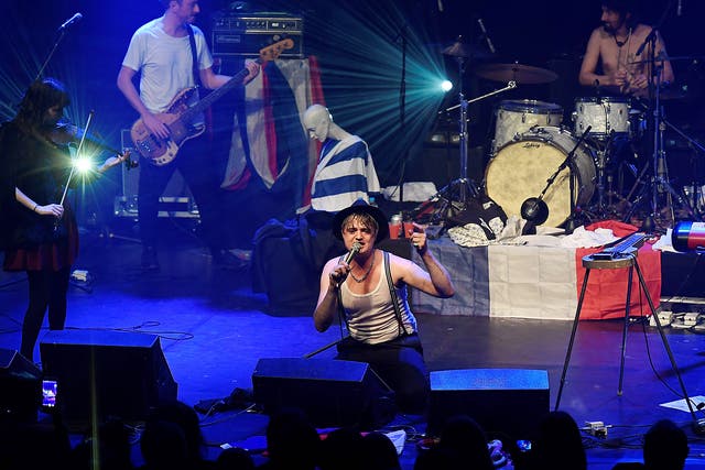 A moment of silence for those who died in the Paris attacks was held before Pete Doherty took the stage
