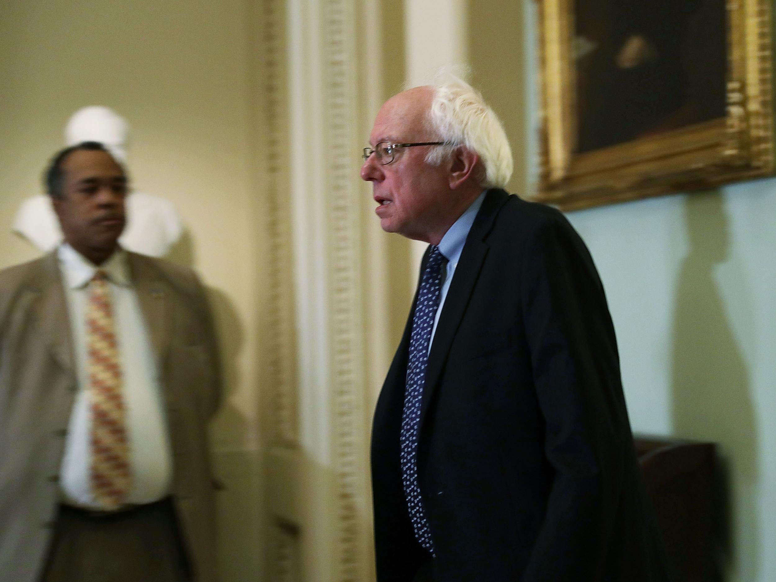 US Senator Bernie Sanders arrives at an election meeting of Senate Democrats at the Capitol November 16, 2016 in Washington, DC