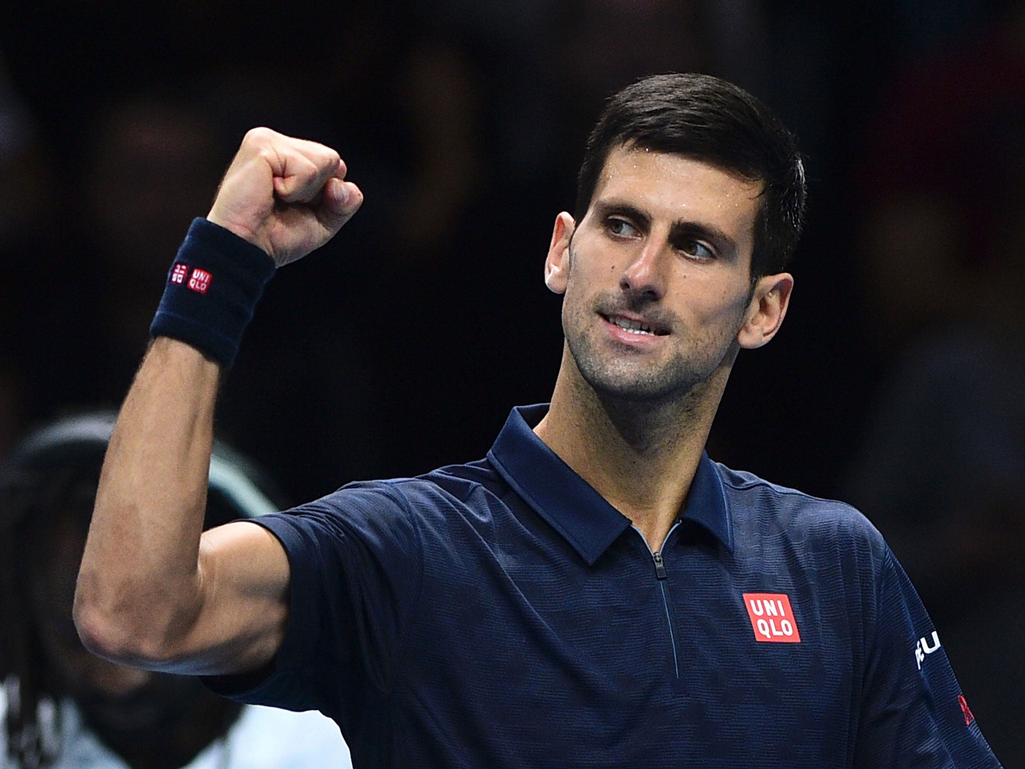 Novak Djokovic celebrates his victory over David Goffin at the ATP Tour finals