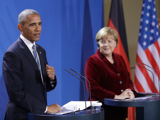 Mr Obama praised Ms Merkel as an 'outstanding partner' at their Berlin press conference, suggesting he would vote for her if he were German