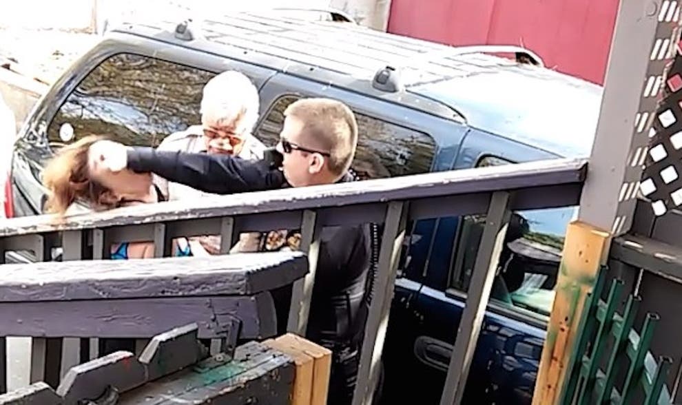 Police officer caught on video punching woman in the face The Independent The Independent
