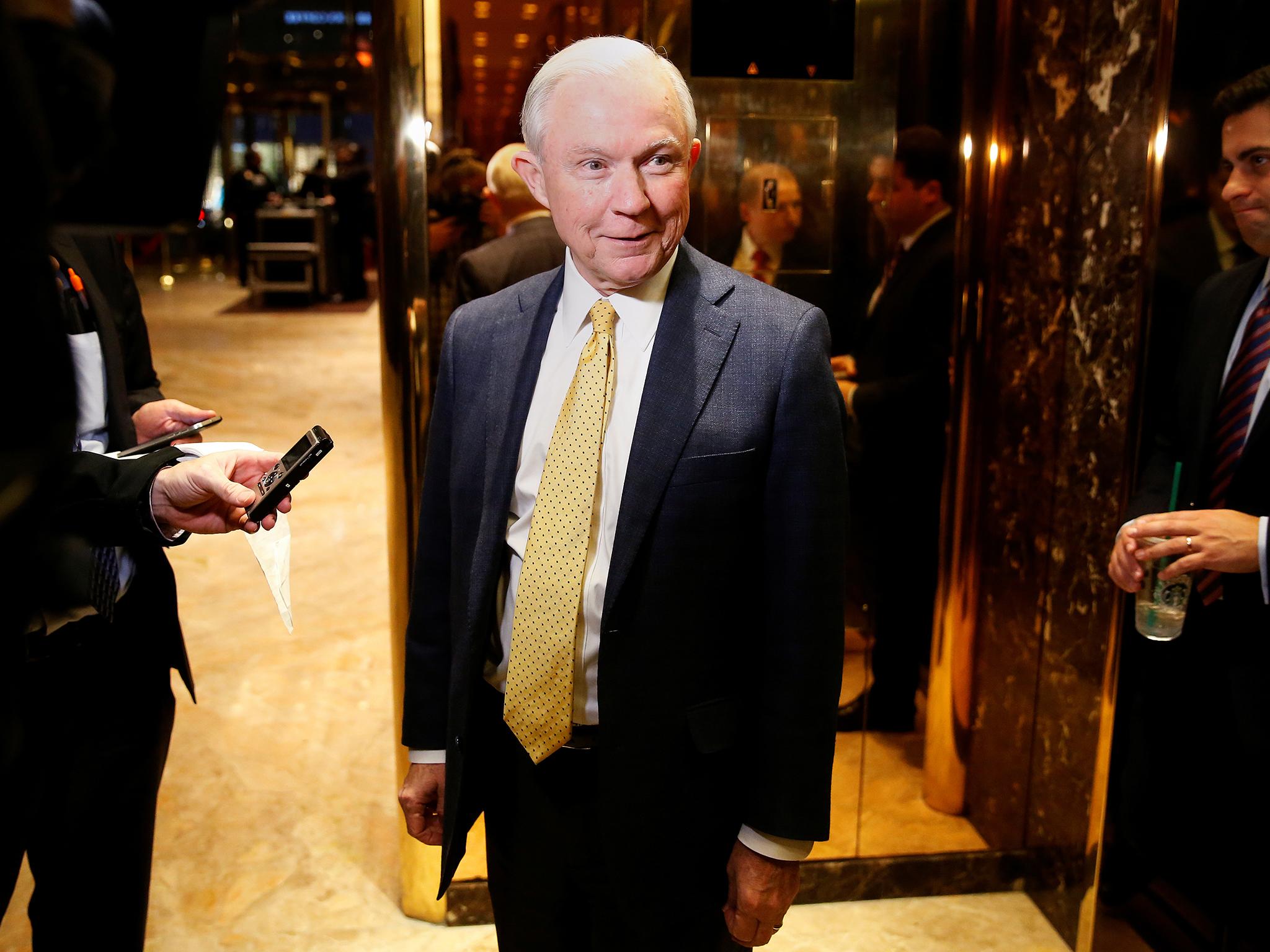 Jeff Sessions, pictured after meeting with Donald Trump at Trump Tower, was accused of showing "gross insensitivity to black people