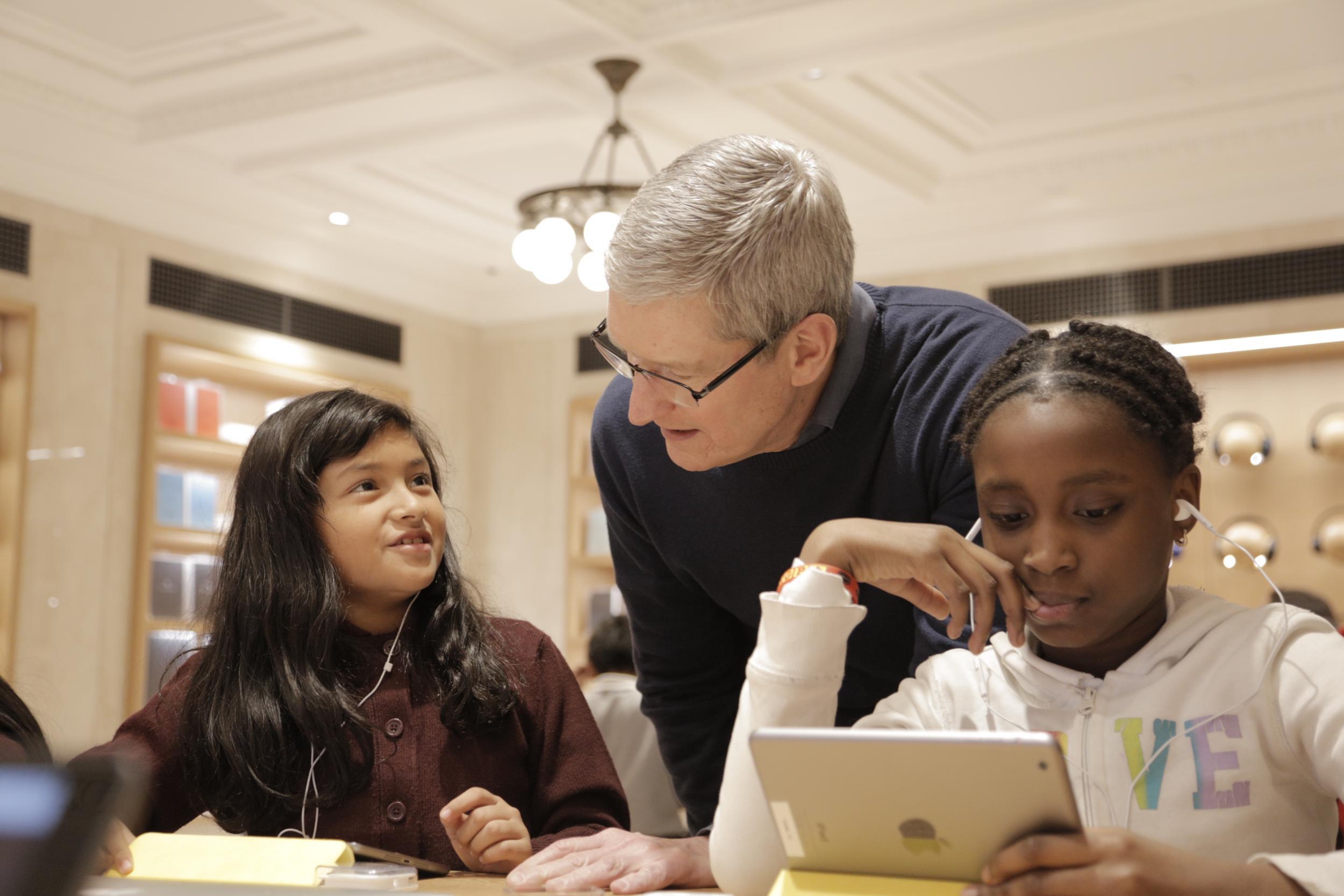 Tim Cook chats with some young coders