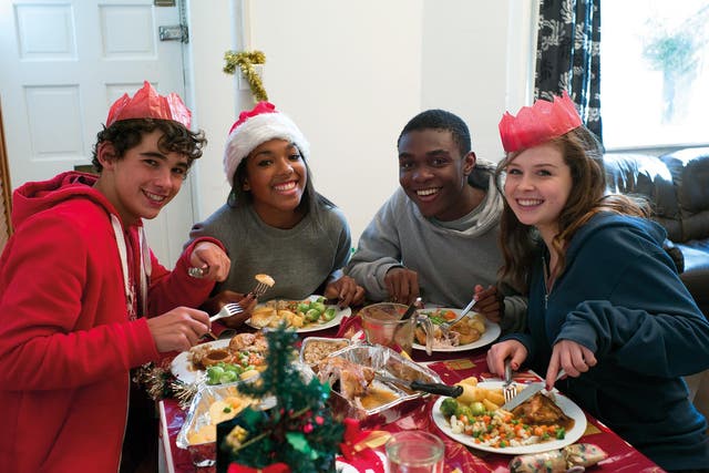 Children enjoy a Christmas lunch at Centrepoint