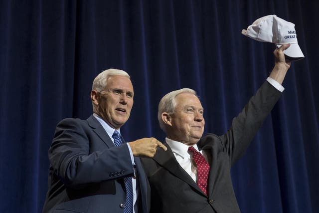 Mike Pence and Jeff Sessions during a campaign event for Donald Trump in Phoenix, Arizona 31 August, 2016