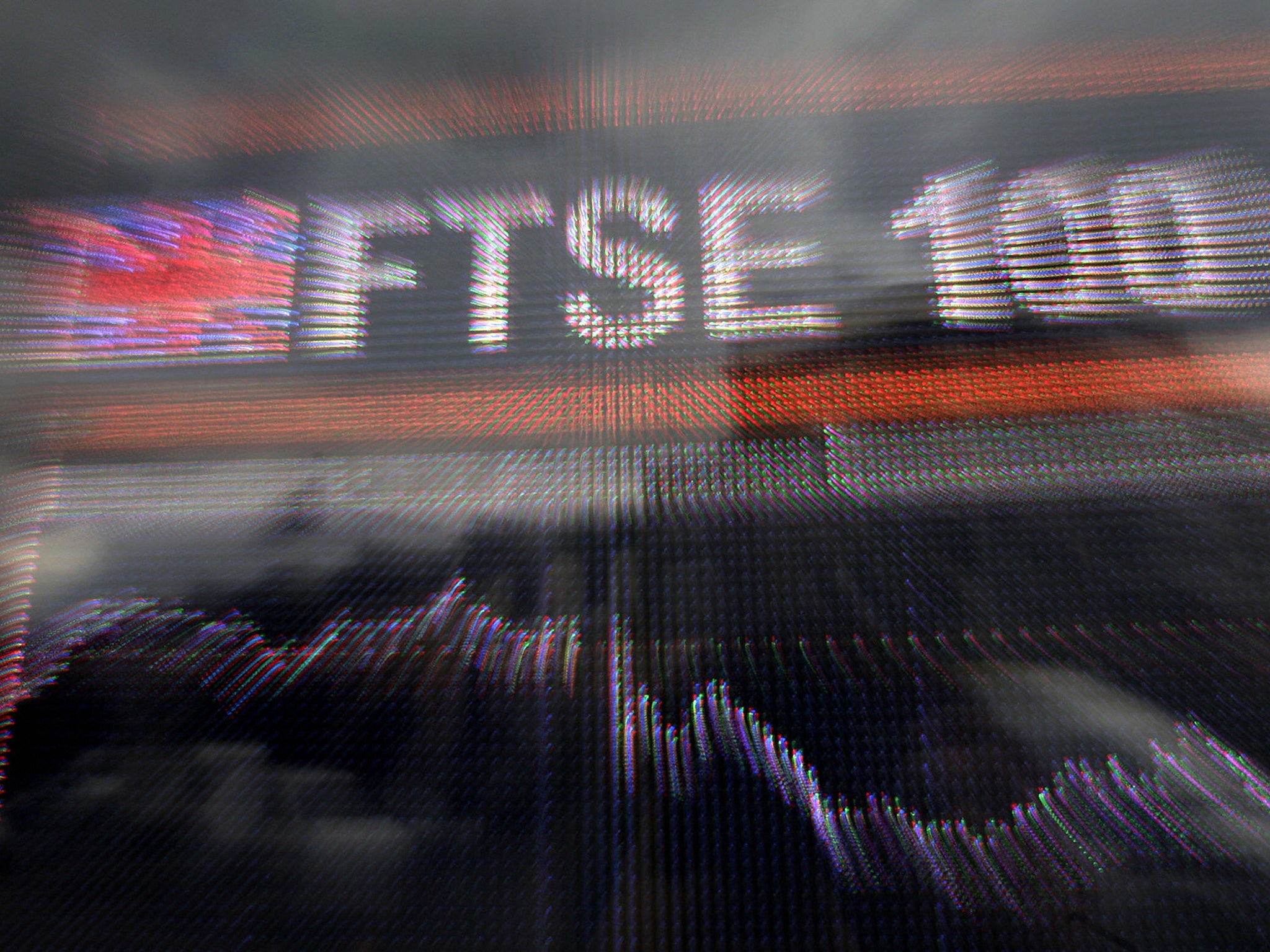 Britain's benchmark share index, the FTSE 100, closed at an all-time high on Wednesday