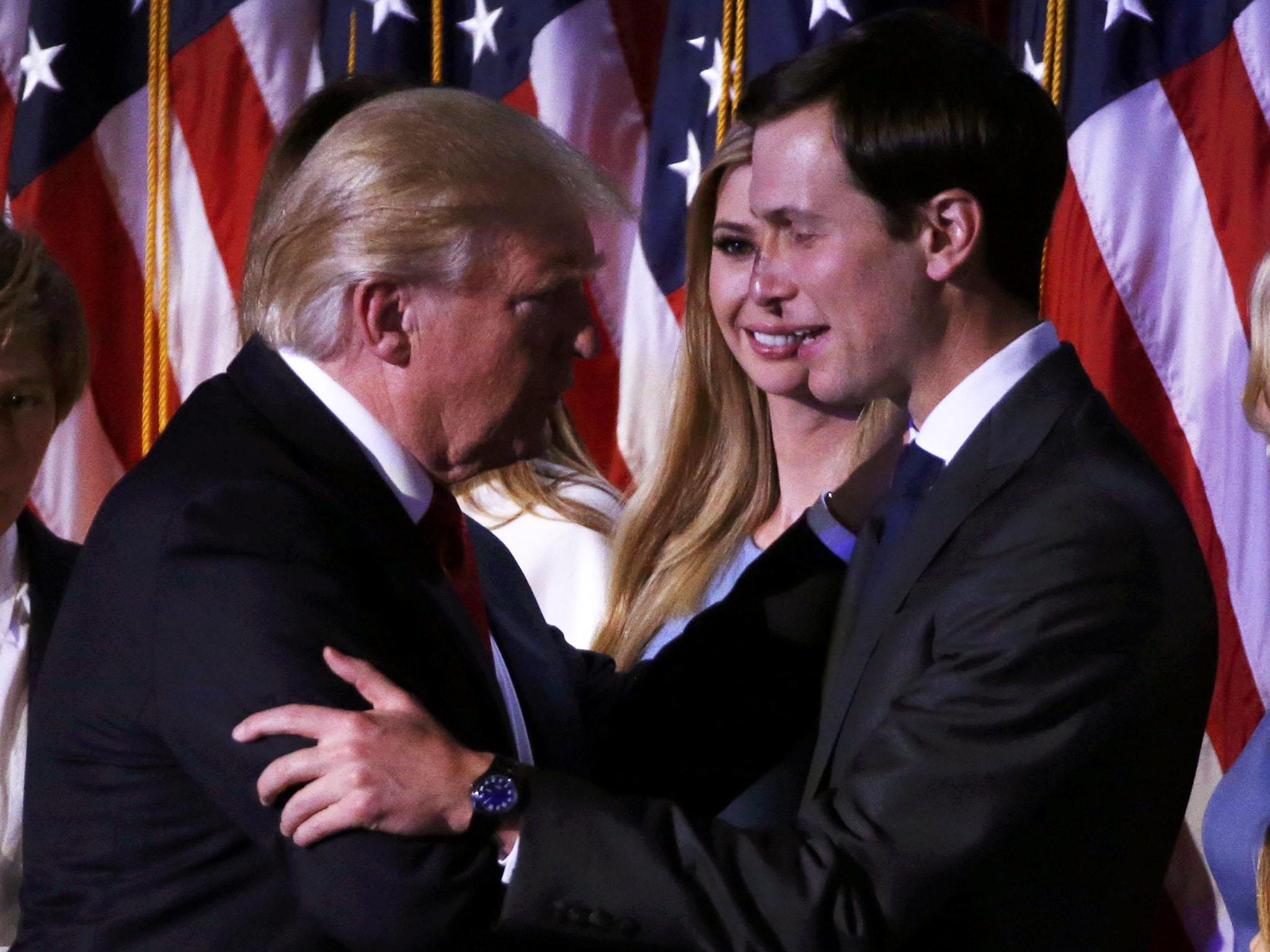 U.S. President-elect Donald Trump greets his daughter Ivanka and son in law Jared Kushner (R) at his election night rally in Manhattan, New York