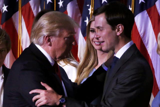 U.S. President-elect Donald Trump greets his daughter Ivanka and son in law Jared Kushner (R) at his election night rally in Manhattan, New York