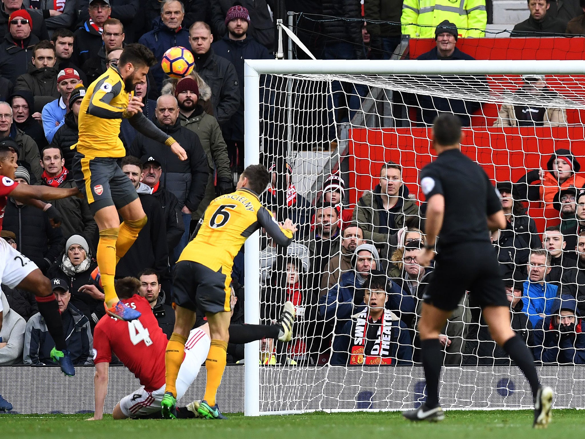 Giroud rises to equalise late on, beating Jones in the air