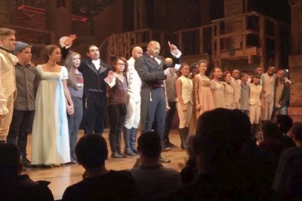 Brandon Victor Dixon who plays Arron Burr, the nationís third vice president, in "Hamilton" speaks from the stage after the curtain call in New York, Friday