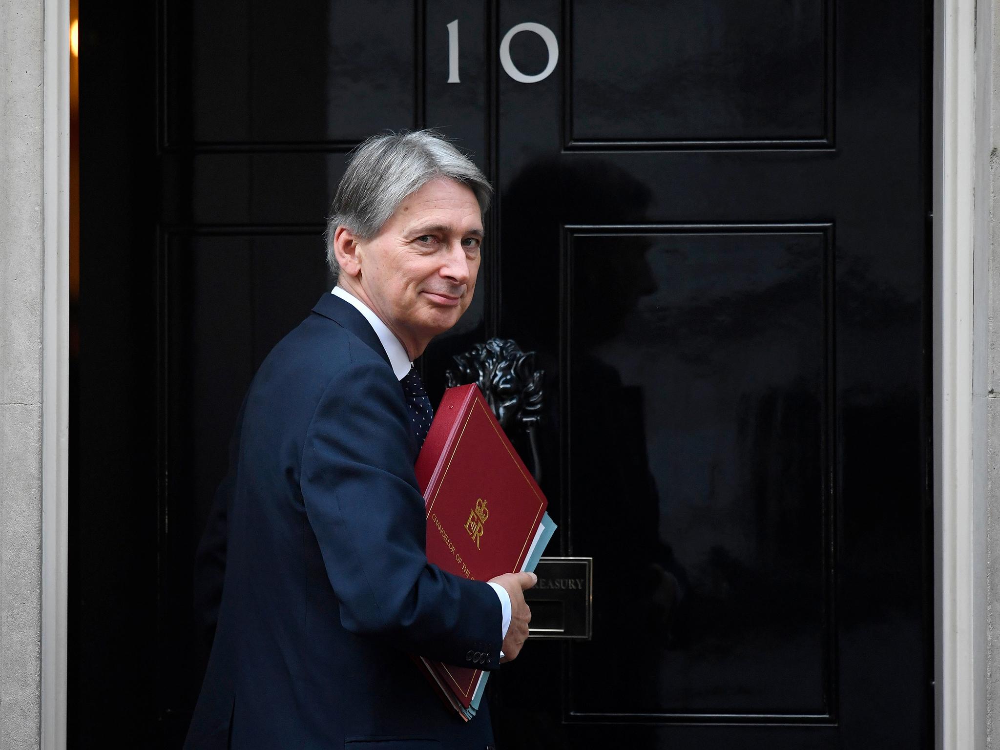 Chancellor Philip Hammond arriving at 10 Downing Street in London