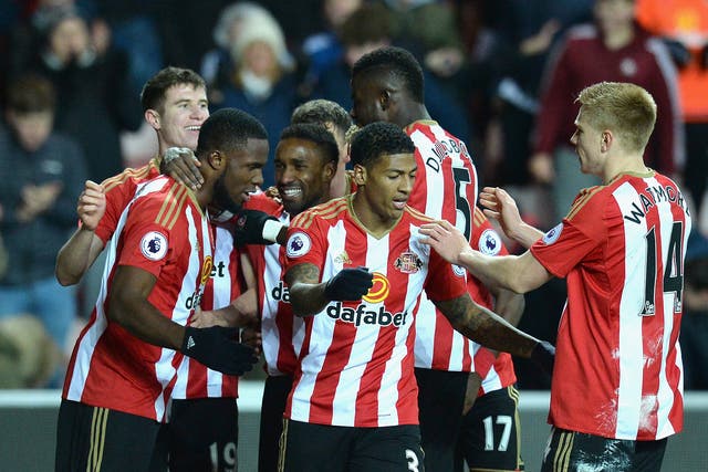 Sunderland's players celebrate Anichebe's second goal at the Stadium of Light
