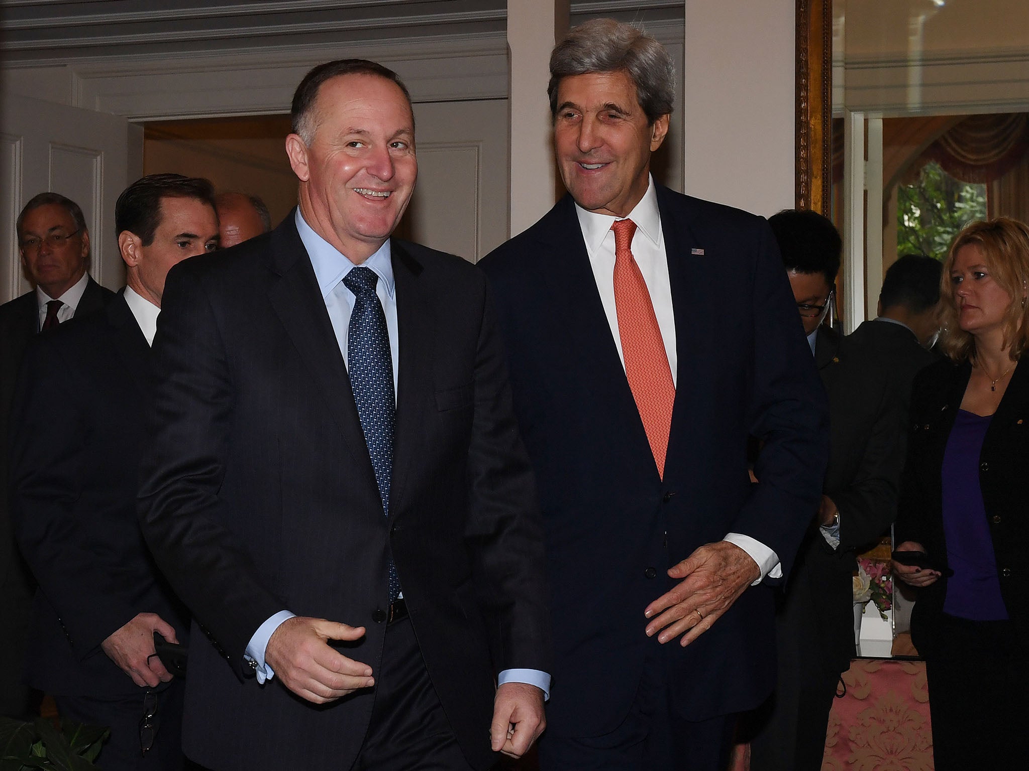 John Key, seen here with US Secretary of State John Kerry has said that the 11 countries of the TPP move forward with the deal