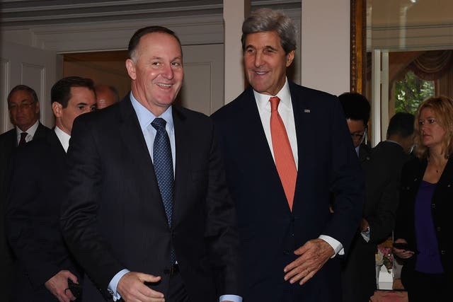 John Key, seen here with US Secretary of State John Kerry has said that the 11 countries of the TPP move forward with the deal