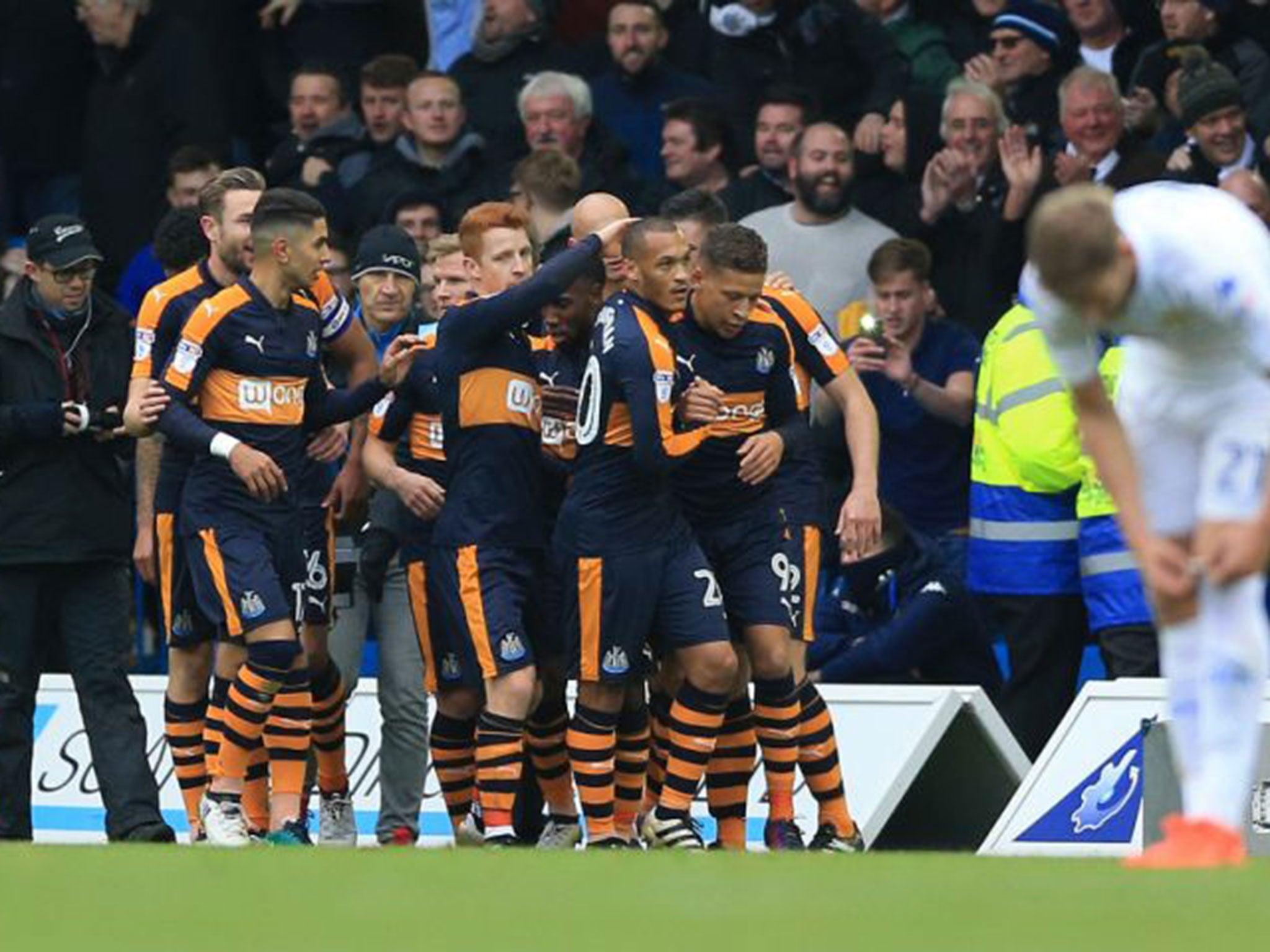 Newcastle players celebrate Dwight Gayle's opening goal against Leeds