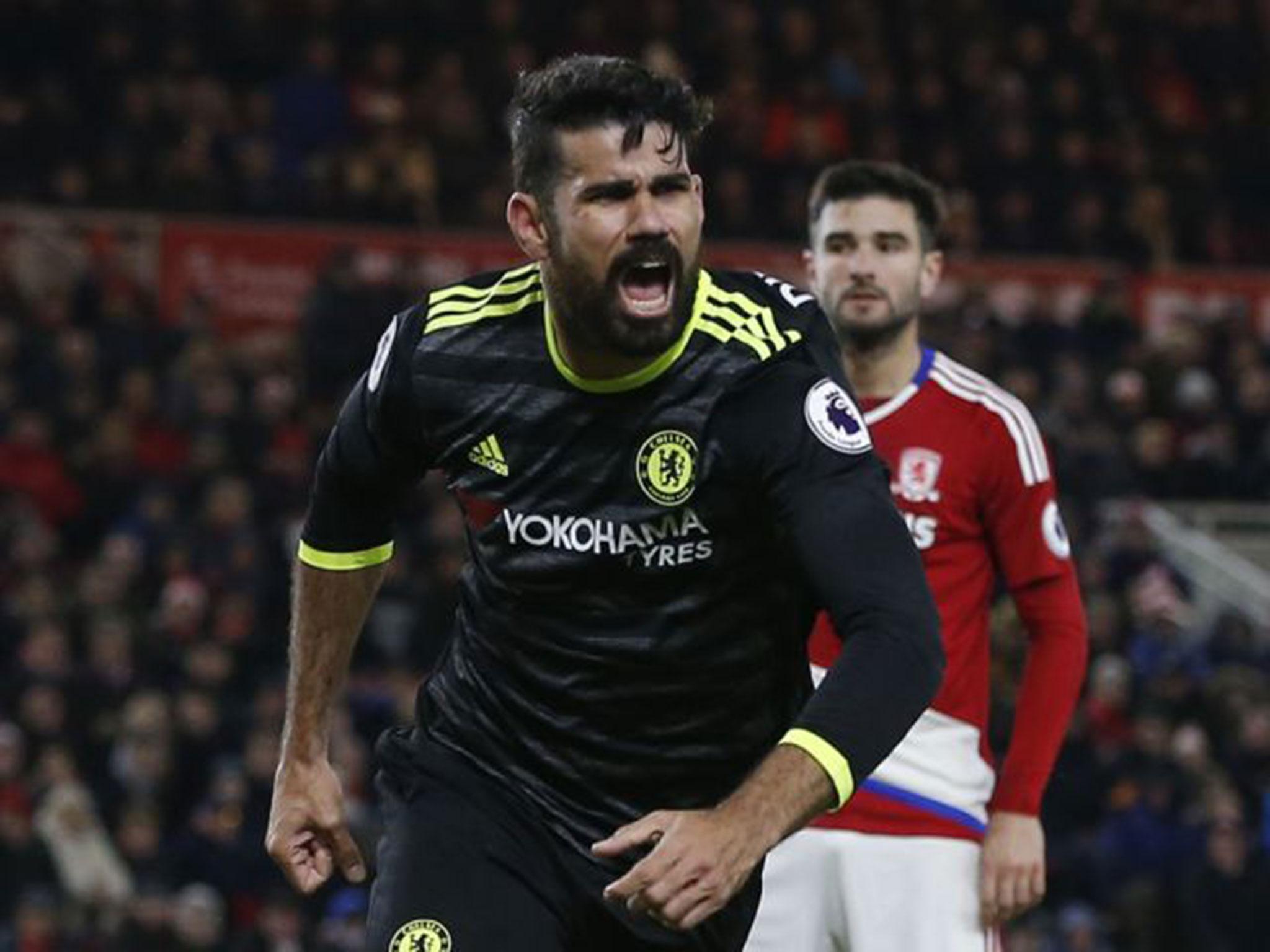 Costa celebrates after putting Chelsea ahead shortly before half-time