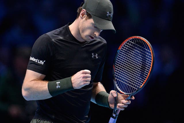 Andy Murray celebrates winning the first set against Novak Djokovic