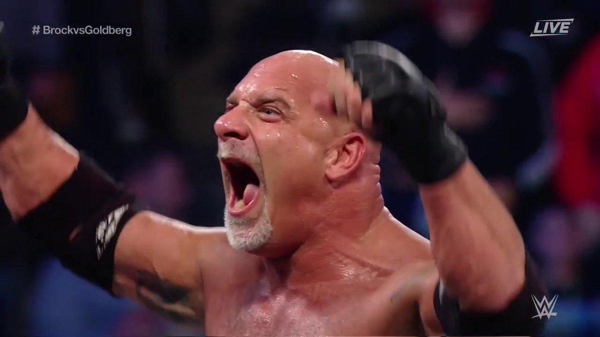 Goldberg celebrates his victory over Brock Lesnar at Survivor Series