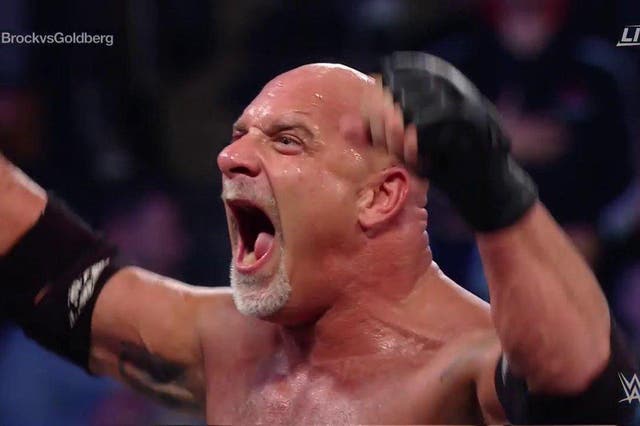 Goldberg celebrates his victory over Brock Lesnar at Survivor Series