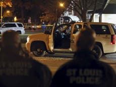 St Louis police officer shot twice in the face in 'ambush attack'