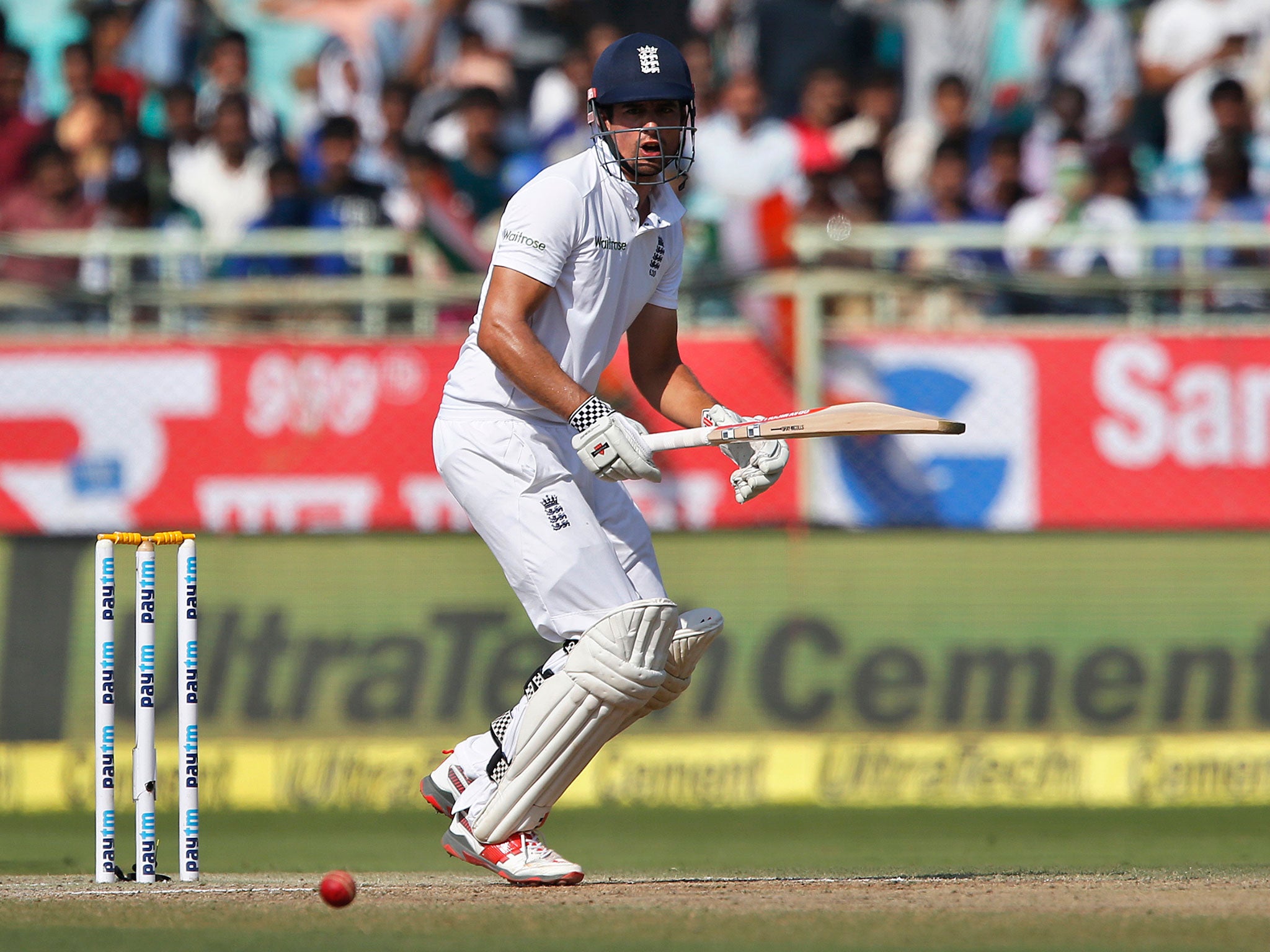 England's captain Alastair Cook looks on as he plays a shot.