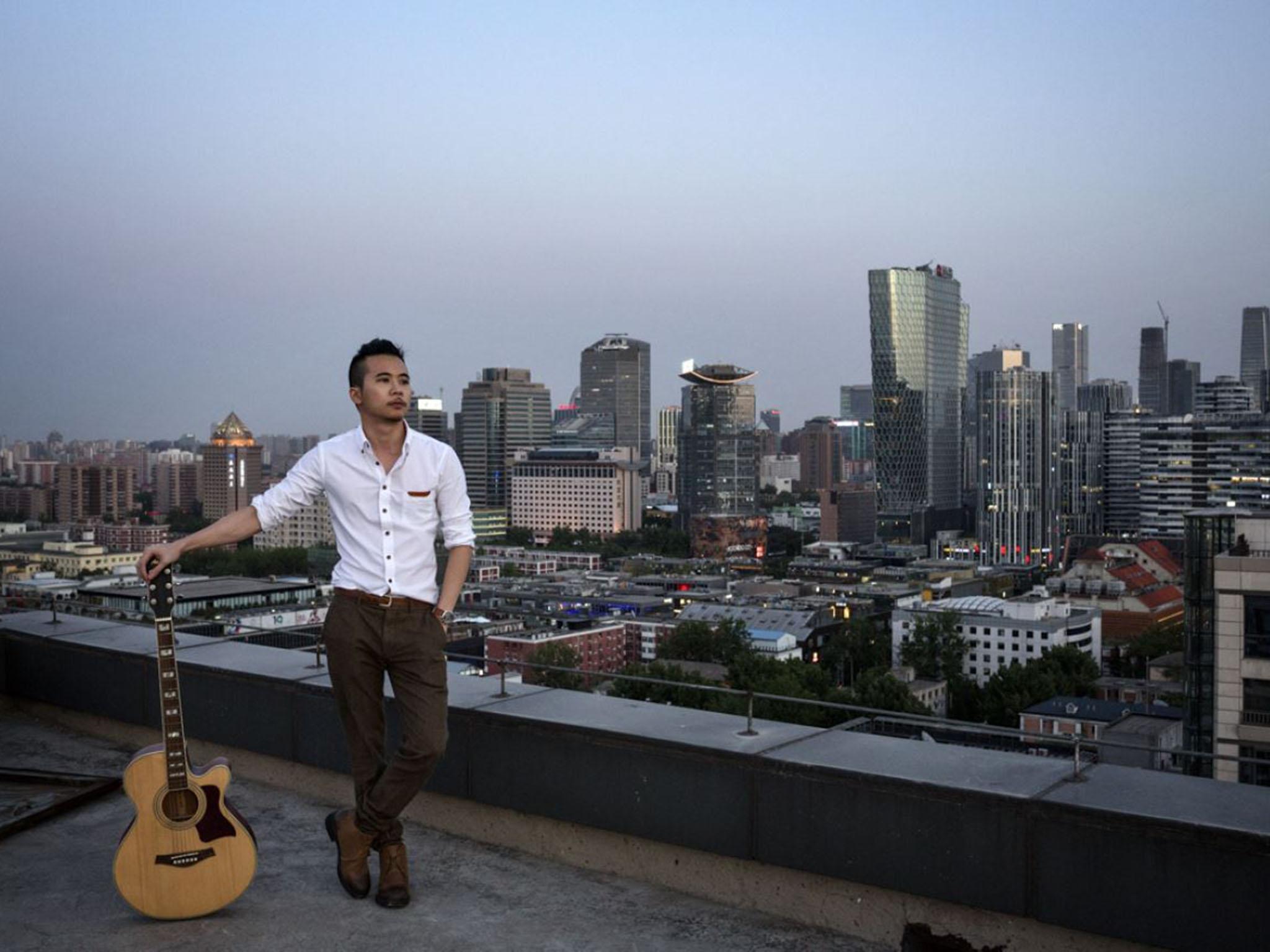 Jason, 25, from Guangdong province, came to Beijing to try to make a career as a musician and escape his parents, who he says were still treating him as a child and wouldn’t accept his homosexuality. He wanted his portrait to be shot on the rooftop of the office building where he’s living