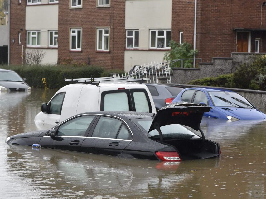 Flooded cars on the Whitchurch Lane in Bristol, Britain