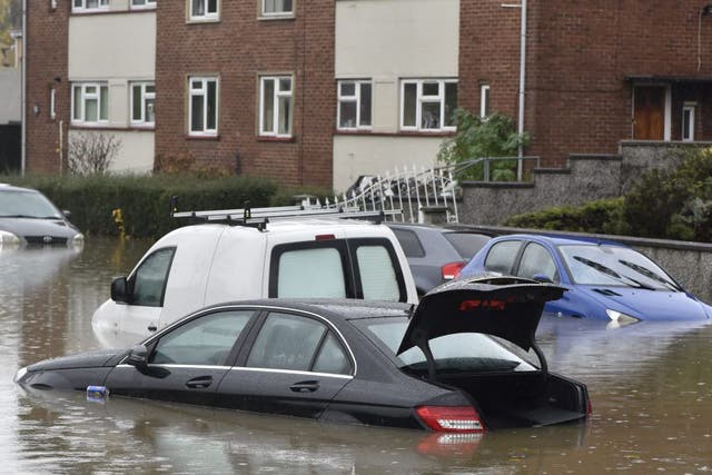 Flooded cars on the Whitchurch Lane in Bristol, Britain