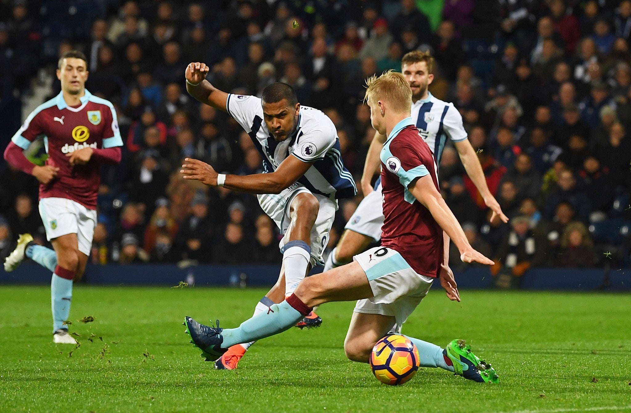 Rondo fires the ball past Ben Mee to complete the rout