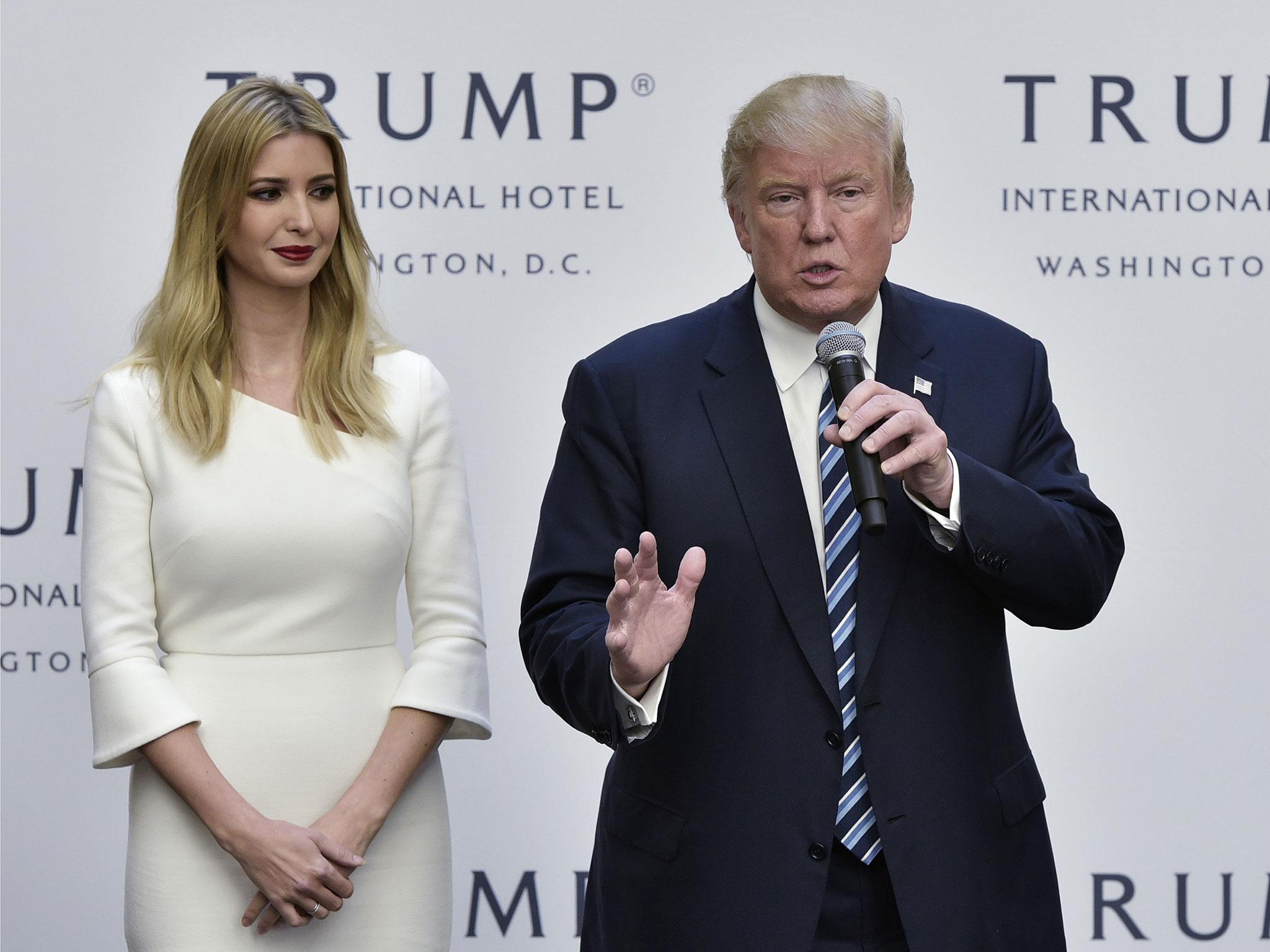 Donald Trump appears alongside his daughter Ivanka at a ribbon cutting ceremony at the grand opening of the Trump International Hotel in Washington, DC on 26 October, 2016