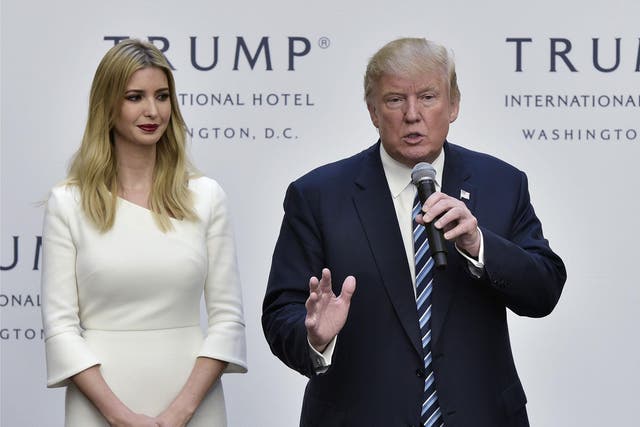 Donald Trump appears alongside his daughter Ivanka at a ribbon cutting ceremony at the grand opening of the Trump International Hotel in Washington, DC on 26 October, 2016