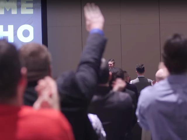 A man performing a Nazi salute at a speech by Richard Spencer at an alt-right conference in Washington DC on 19 November