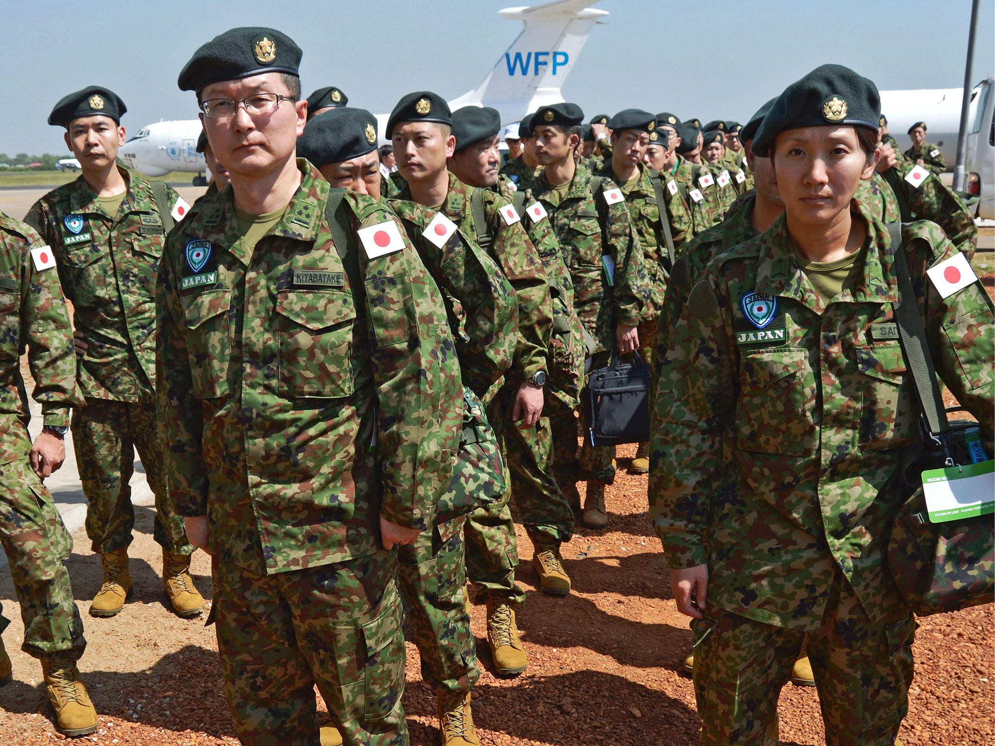 Members of the Japanese Ground Self-Defence Force (GSDF) arrive at the airport in Juba, South Sudan, on 21 November, 2016