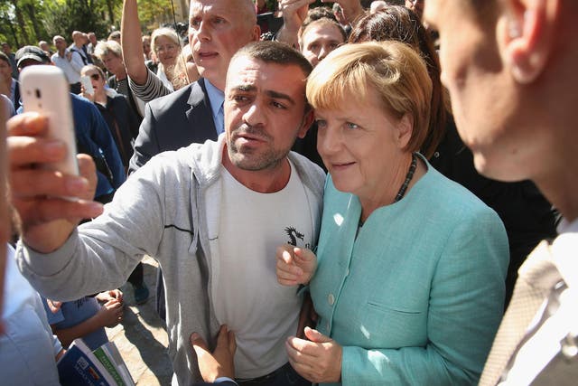 Chancellor Angela Merkel adopted an open-door policy towards the refugee wave in 2015