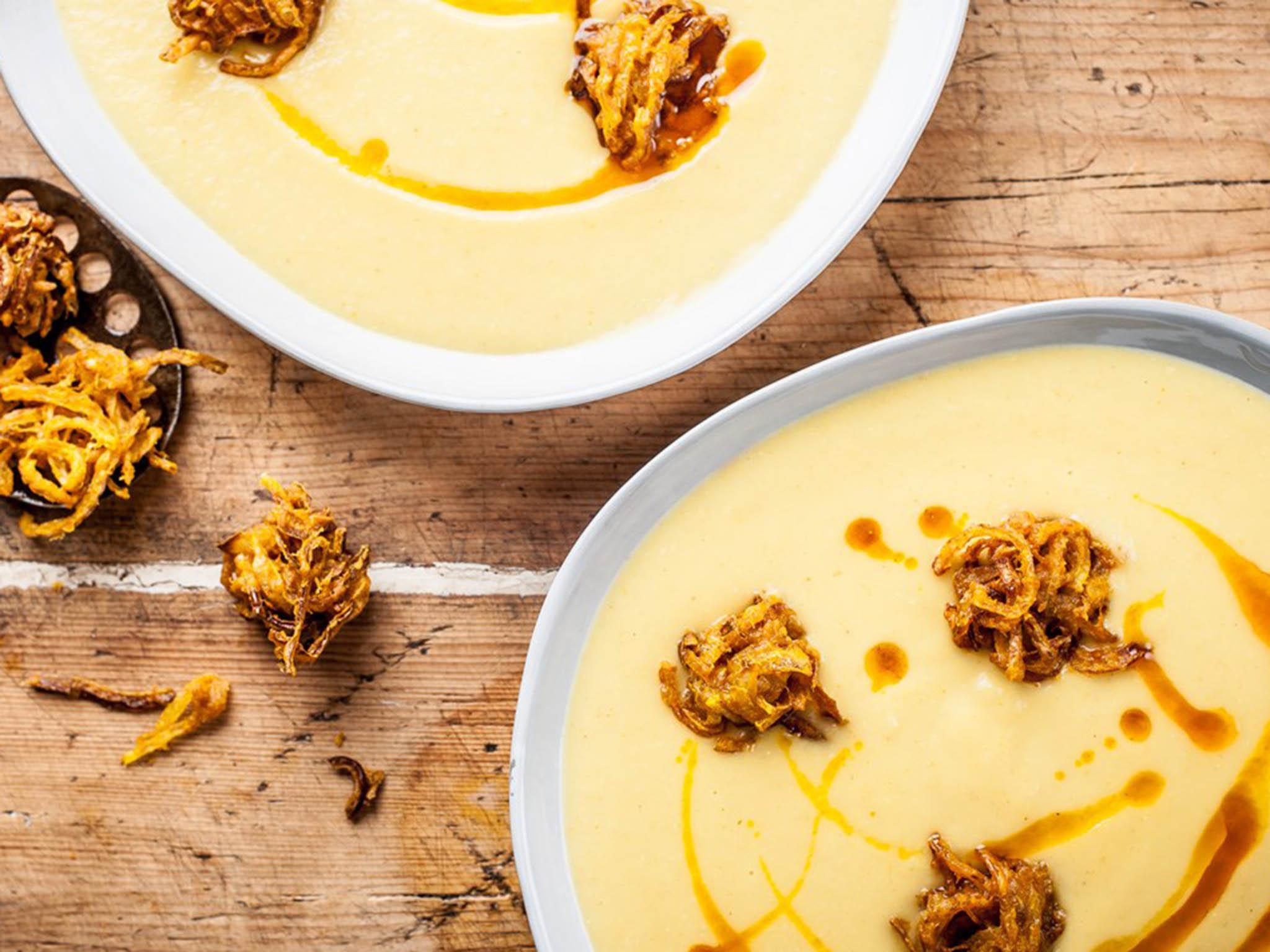 Curried parsnip soup with pear is enlivened by the addition of onion bhajis