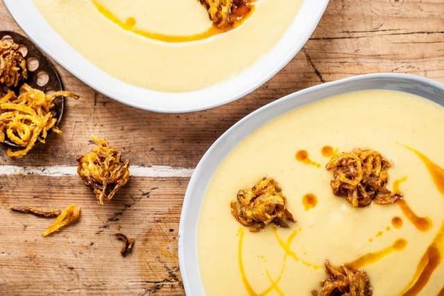 Curried parsnip soup with pear is enlivened by the addition of onion bhajis