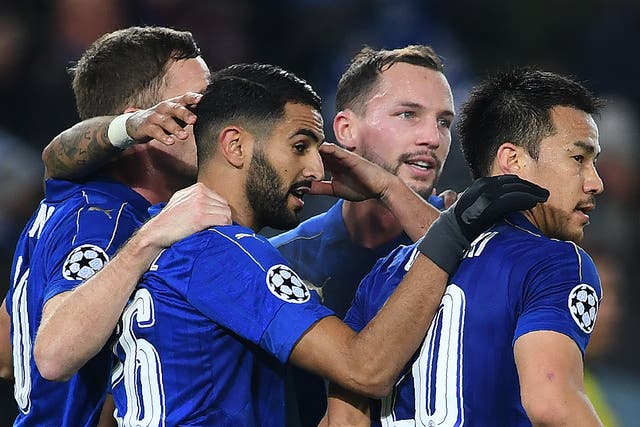 Leicester's players celebrate Okazaki's early opening goal