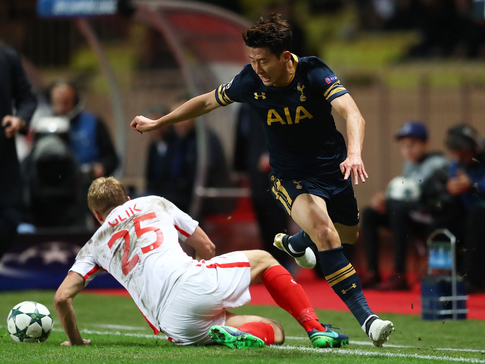 Son looks to take the ball past Kamil Glik