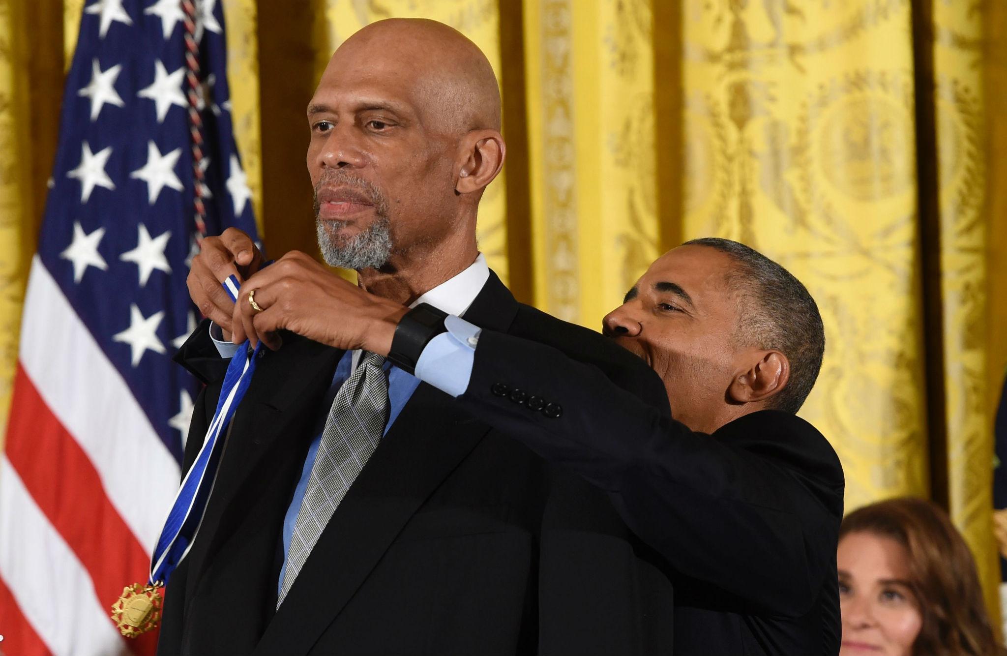 NBA legend Kareem Abdul-Jabbar is 7 foot 2, which made this part of the event a challenge even for Mr Obama, who is 6 foot 1