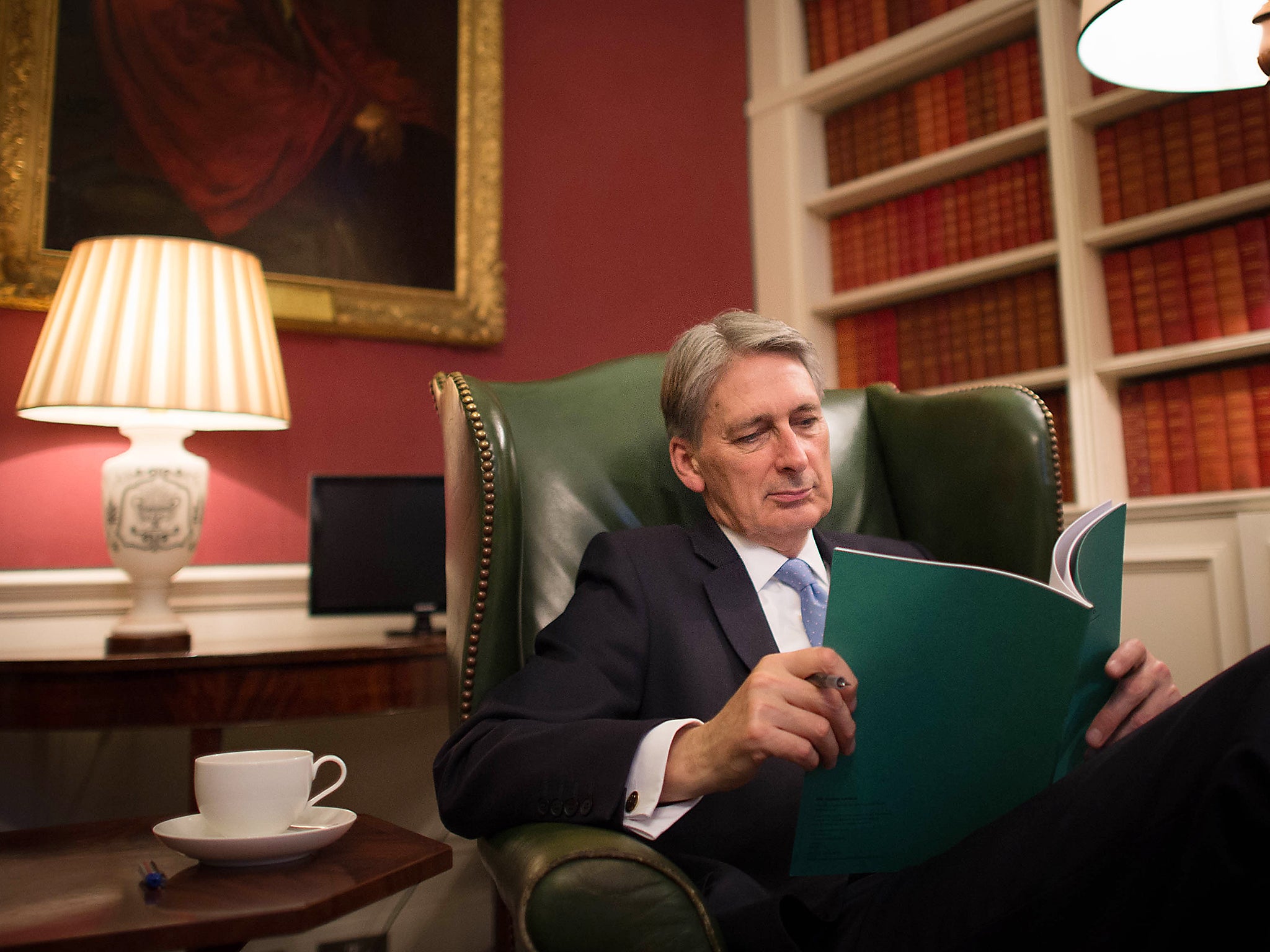 Chancellor Philip Hammond reads through his Autumn Statement in 11 Downing Street
