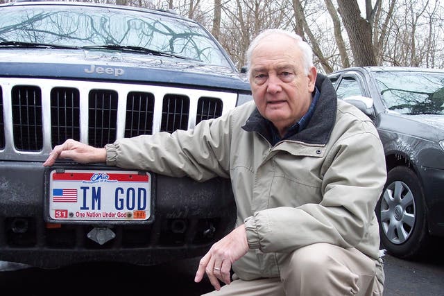 Benny Hart with his IM GOD licence plate issued by the state of Ohio