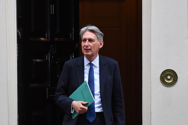 Chancellor Philip Hammond has been cuddling up to the City